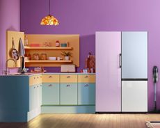 lilac, sky blue and white frideg freezer in a purple painted ktichen with blue cabinets - samsung