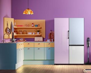 lilac, sky blue and white fridge freezer in a purple painted ktichen with blue cabinets - samsung