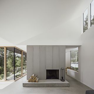 Camera House by Leckie Studio showing white minimalist interior