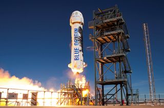 Blue Origin's New Shepard rocket and capsule lift off from a West Texas launch pad during a suborbital test flight on Jan. 22, 2016.