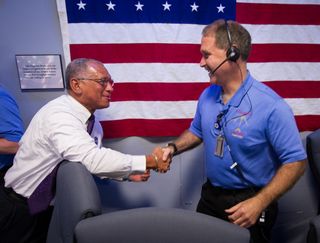 NASA Chief Charles Bolden Congratulates Team Member