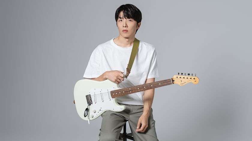 Jukjae with his signature Fender Strat