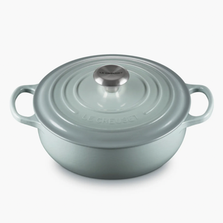 A light blue dutch oven pan 