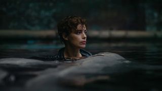 A still of a woman in water from Netflix's Under Paris