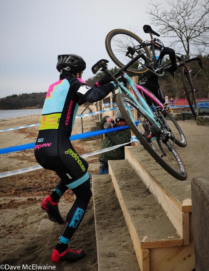 Riders climbing the stairs at the end of the beach run