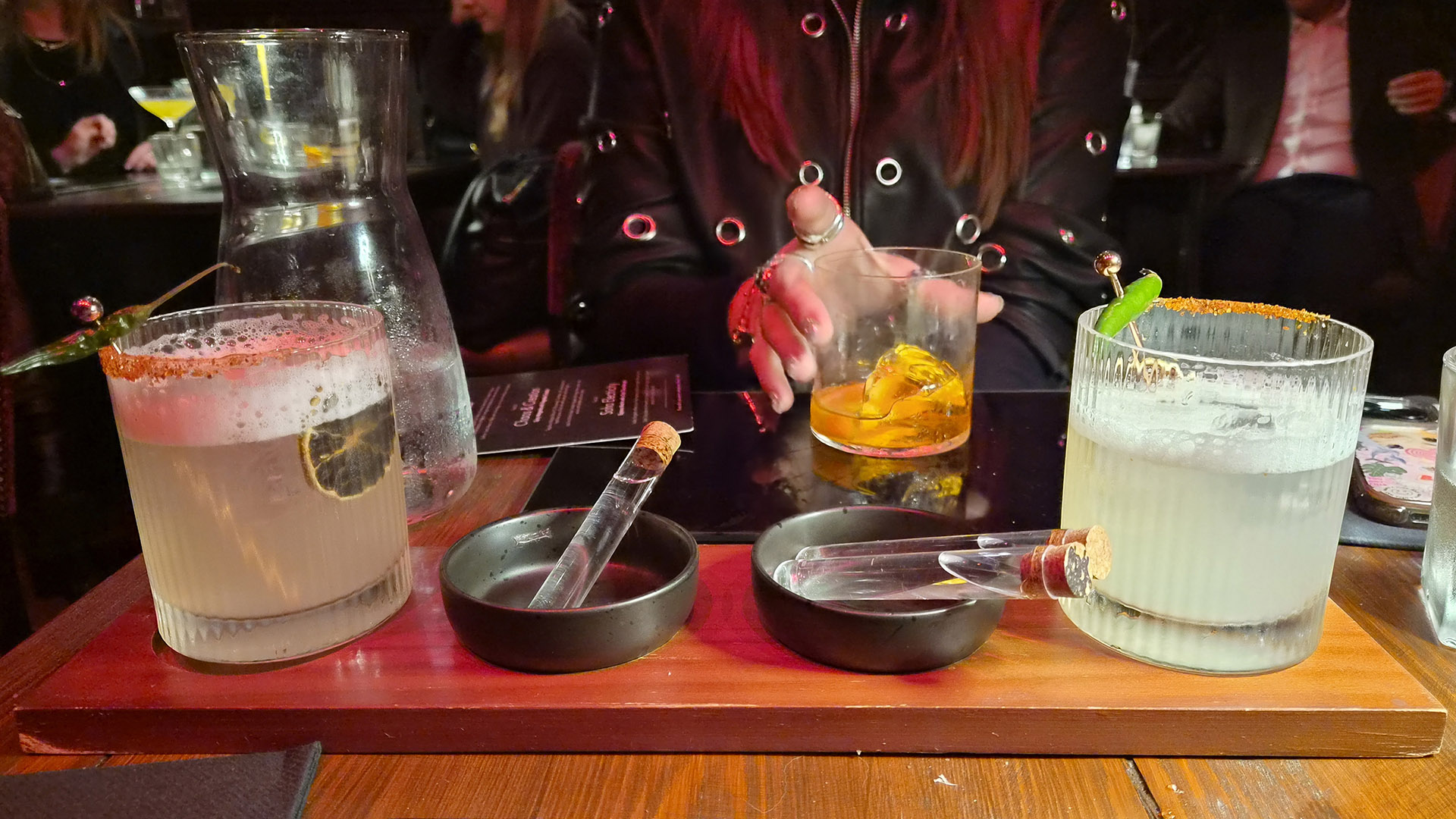 A photo of two cocktails.