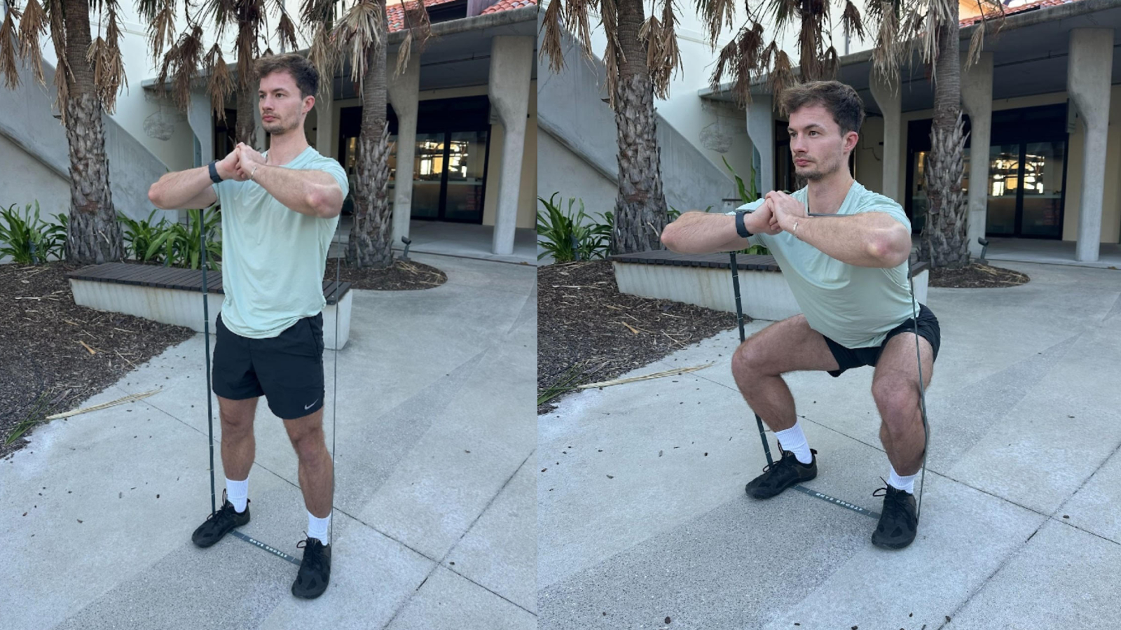 Man performing resistance band squat