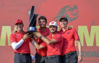 The Fireballs LIV Golf team with the trophy in Jeddah