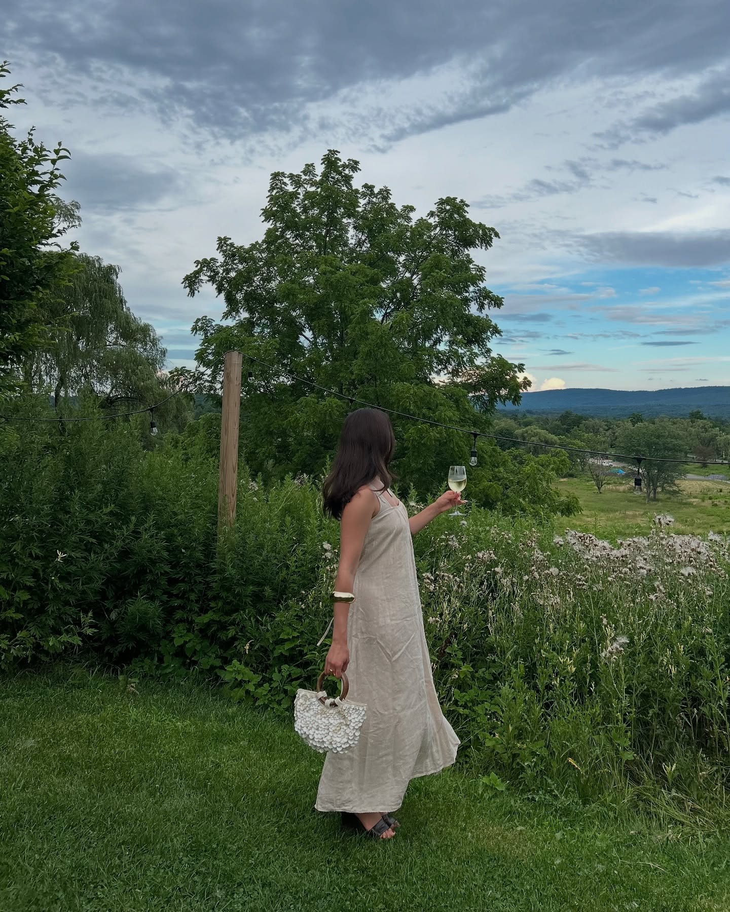 Alyssa Brascia standing outdoors in the Hudson Valley.