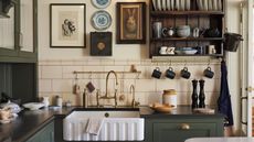 Butler sink kitchen area with open dish rack and hanging rail
