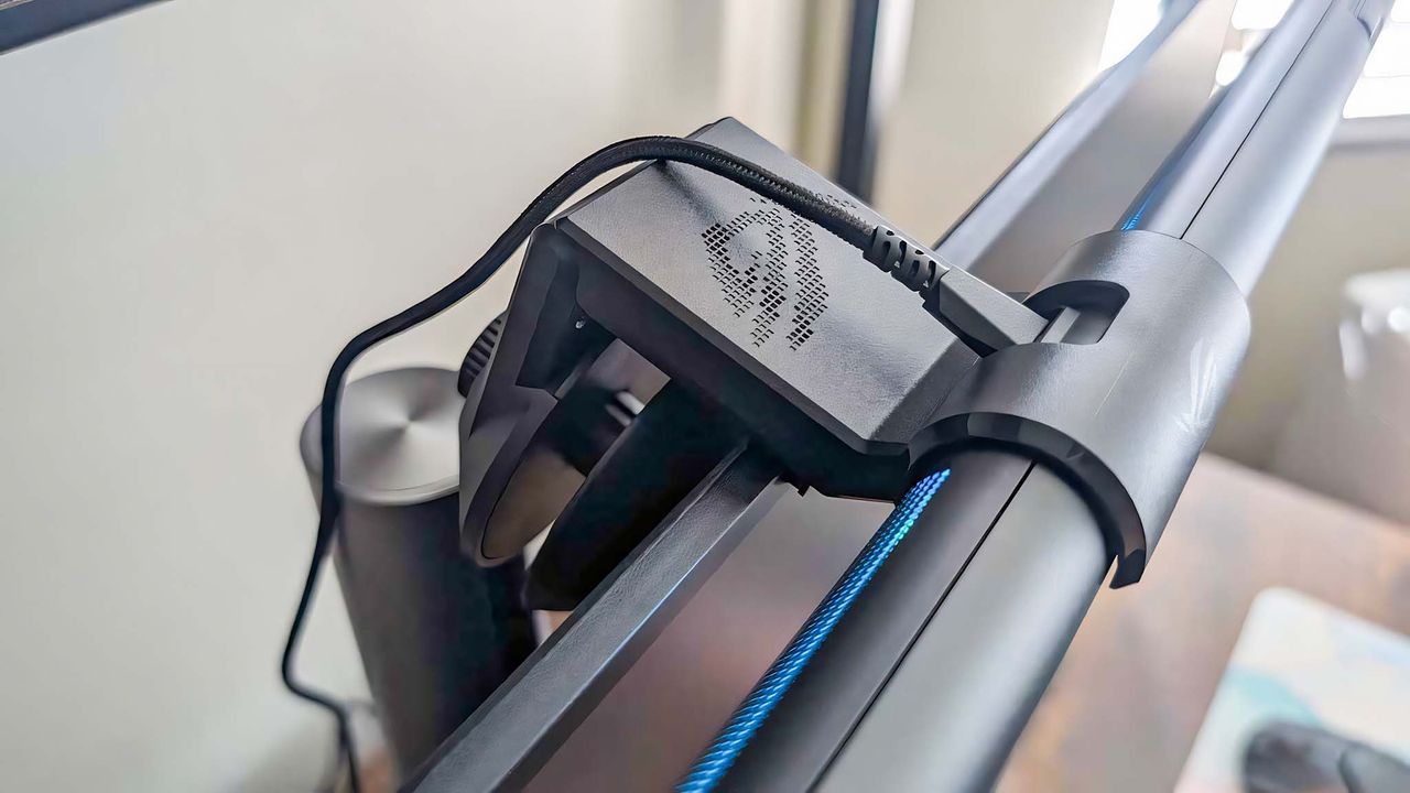 A close-up of the USB-C cable coming out of the back of the ASUS ROG Aura Monitor Light Bar.