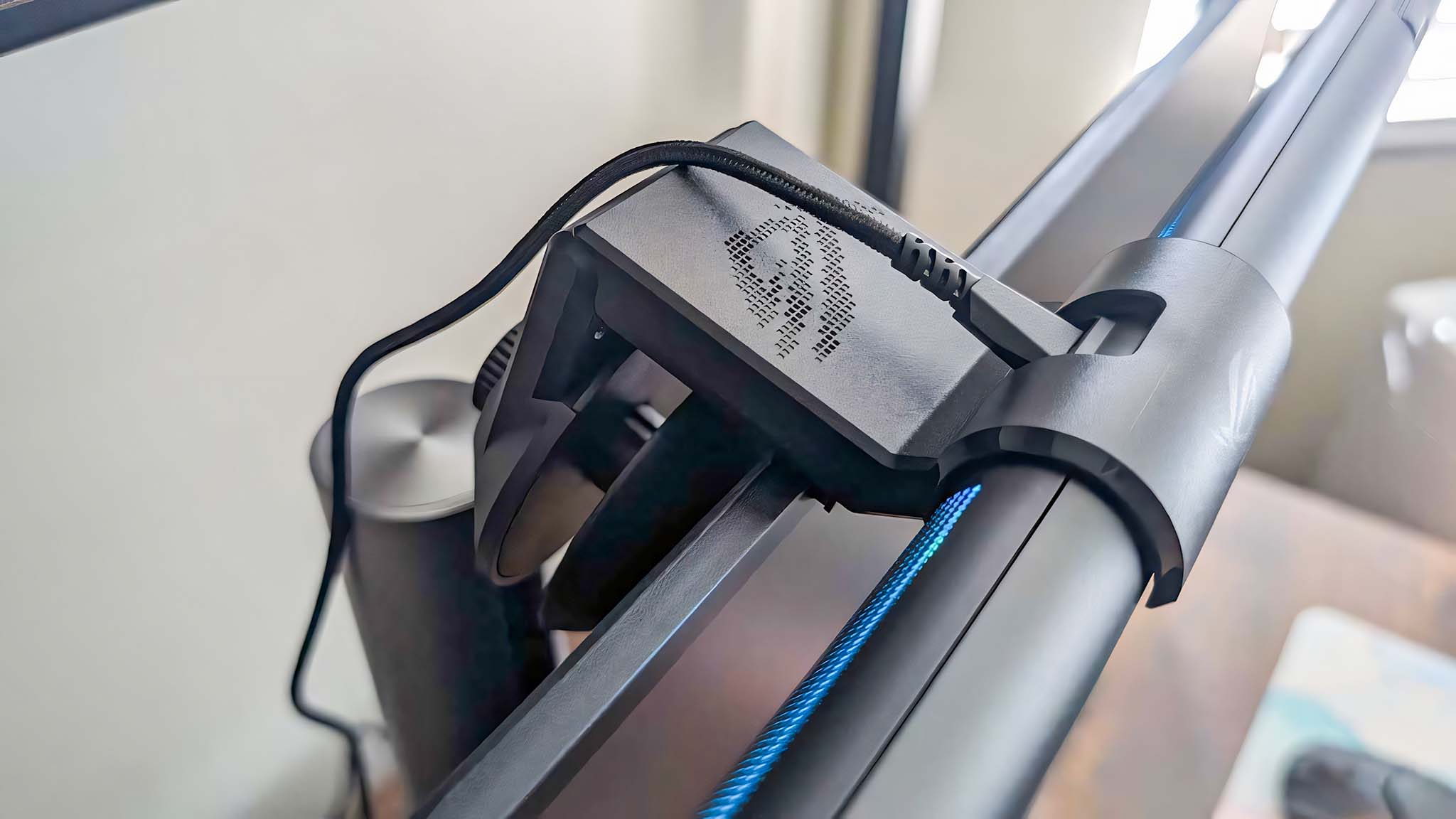 A close-up of the USB-C cable coming out of the back of the ASUS ROG Aura Monitor Light Bar.