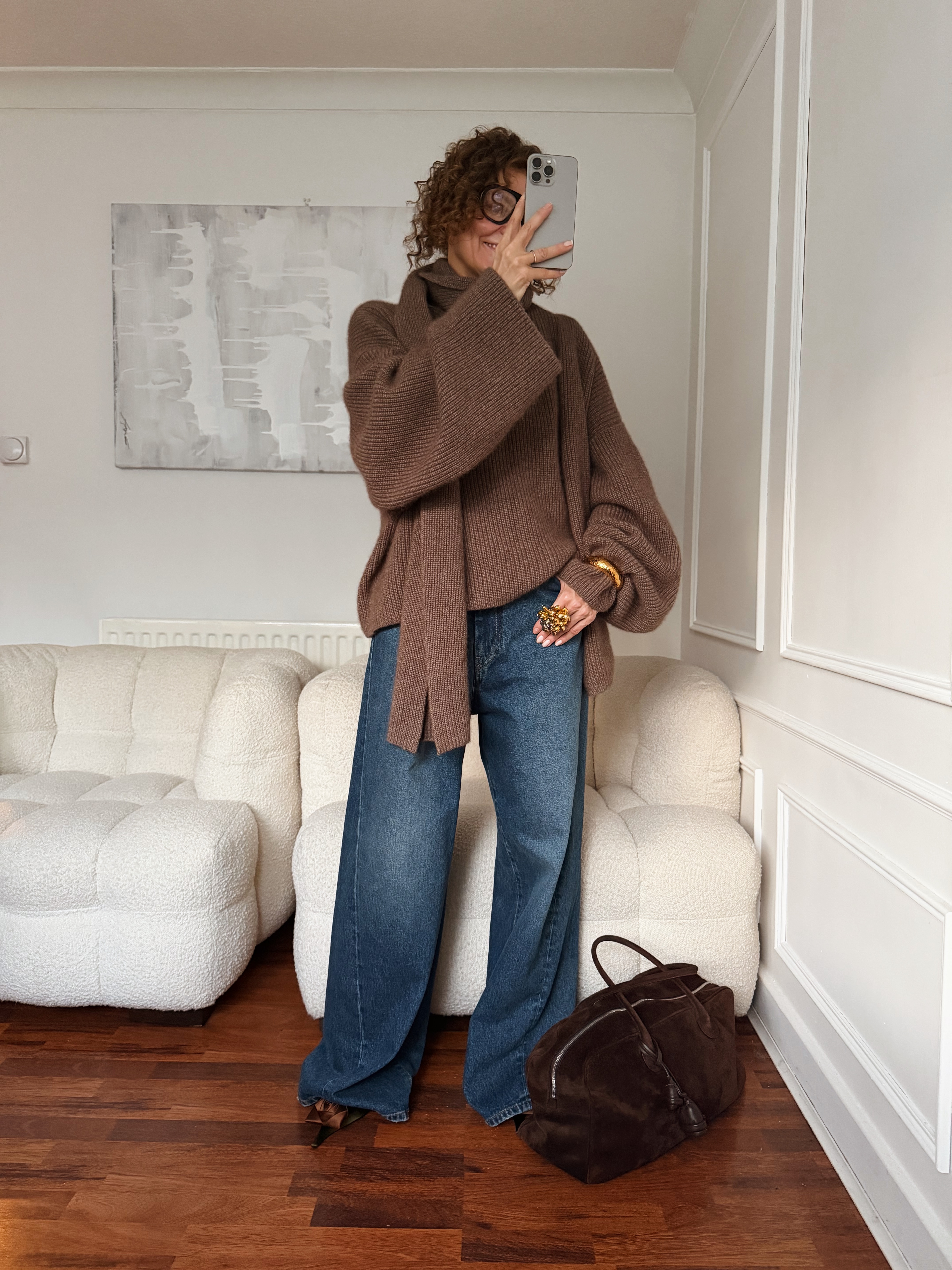 Renia Jazdzyk wearing a scarf sweater