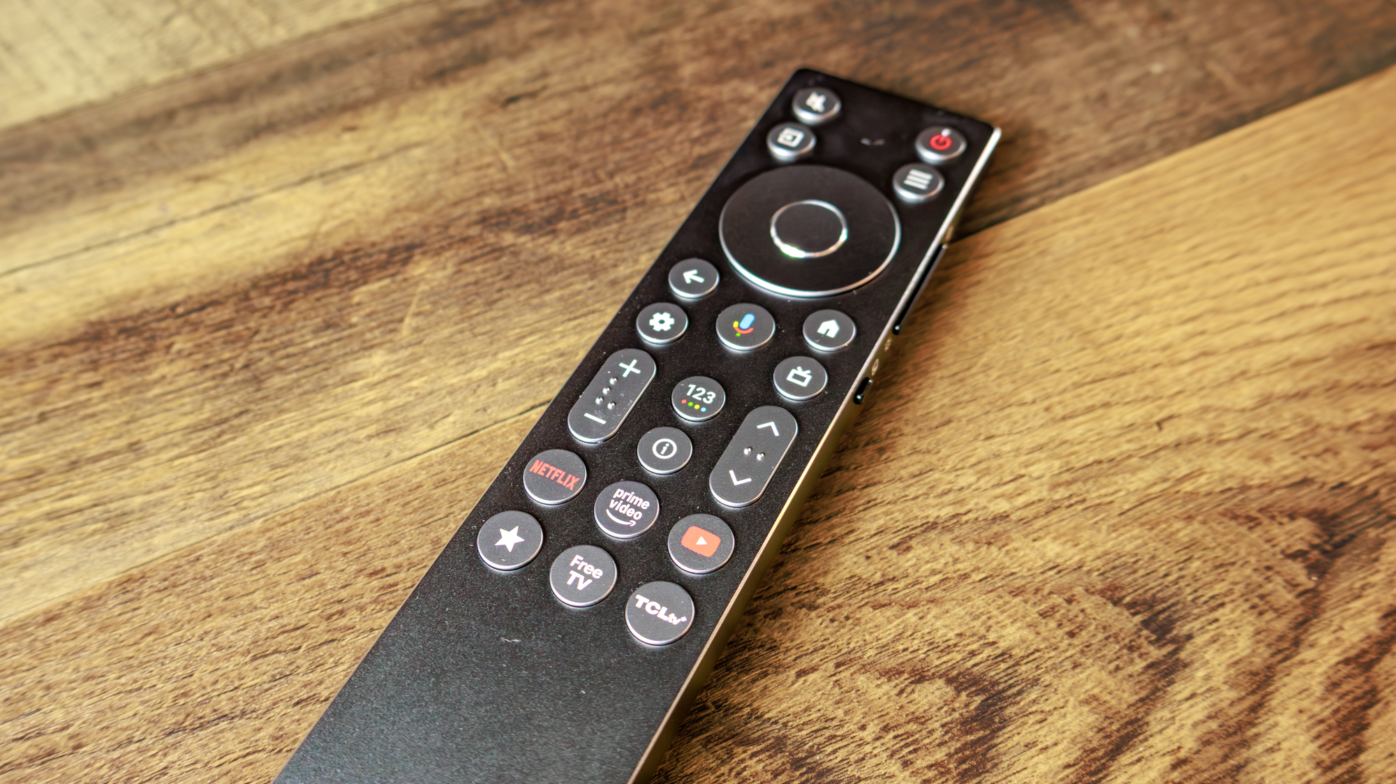 The remote for a TCL QM8L TV