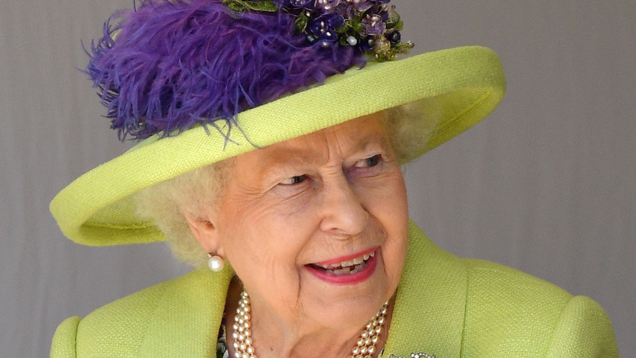 The royal wedding Queen Elizabeth missed revealed. Seen here is the Queen at the wedding of Prince Harry and Meghan Markle 