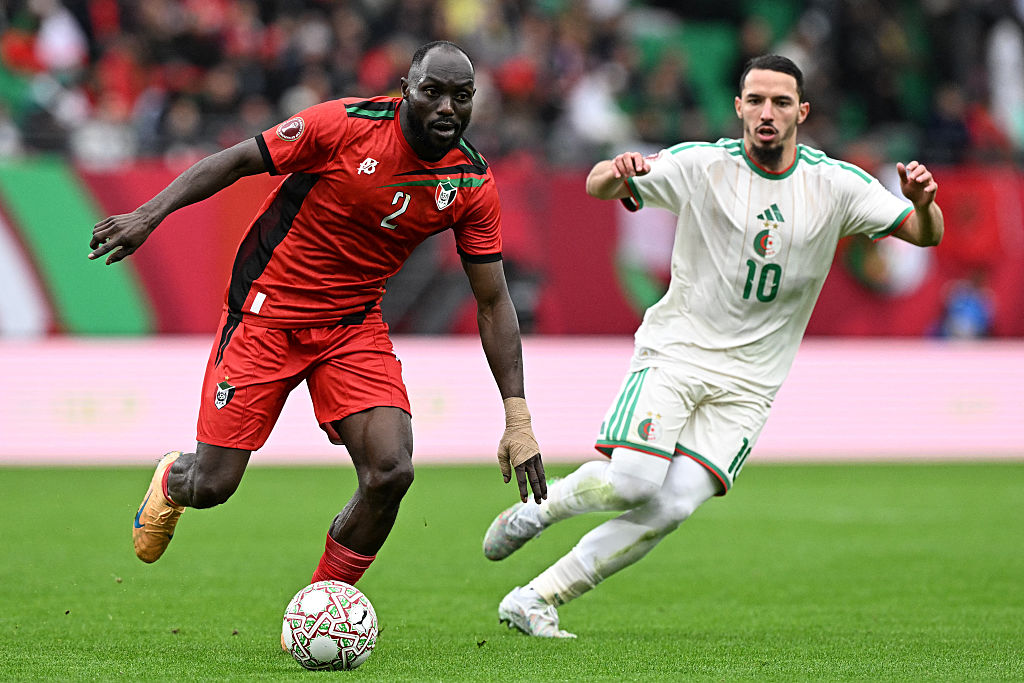 Sudan's midfielder #2 Mohamed Abuaagla (L) beats Algeria's midfielder #10 Ismael Bennacer to the ball during the Africa Cup of Nations (CAN) Group E football match between Algeria and Sudan at Moulay Hassan Stadium in Rabat on December 24, 2025. (Photo by Gabriel BOUYS / AFP)