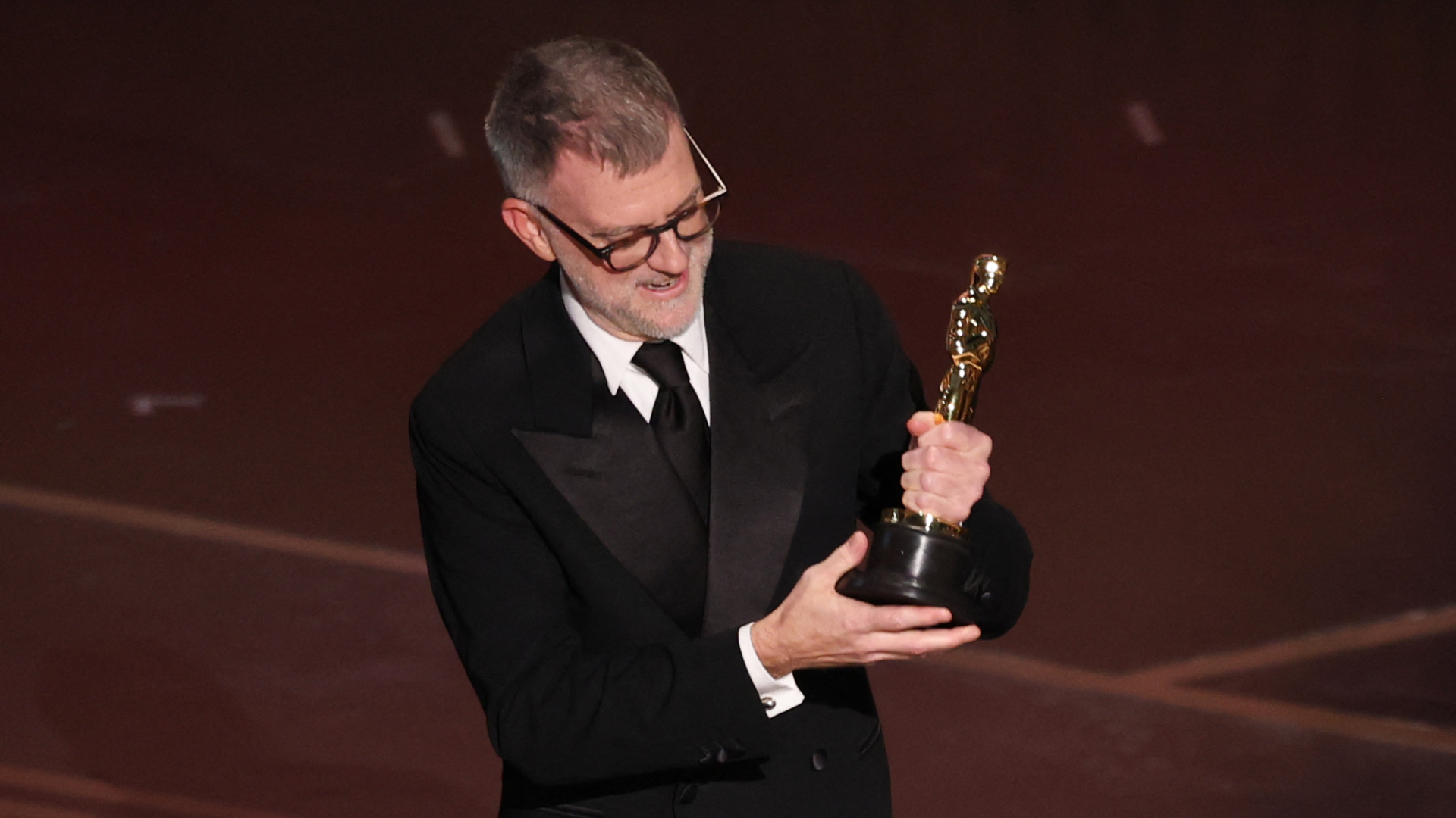 Paul Thomas Anderson accepting the Academy Award for Best Director for One Battle After Another