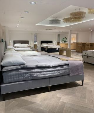 Mattresses arranged upstairs in the Vispring showroom.