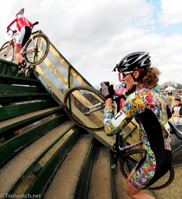 Mical Dyck (Pro City Racing) on the steps behind Meredith Miller