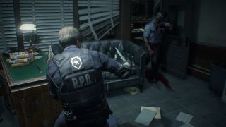 Leon Kennedy fighting a zombie in Resident Evil 2