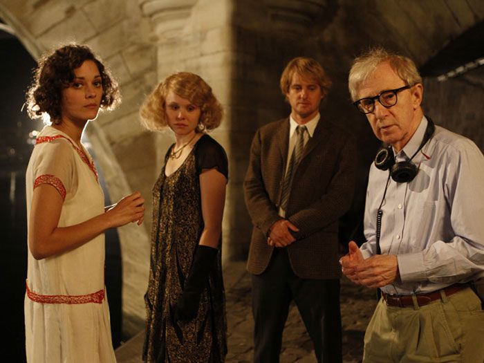 In Woody Allen&#039;s film Midnight in Paris, the main character Gil, played by Owen Wilson (center) travels back in time from modern-day Paris to the city in 1920s.