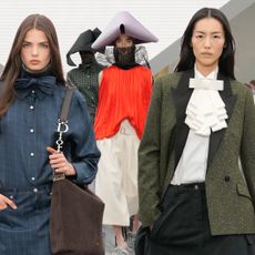 four Dior models walking the Dior runway 