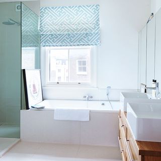 bathroom with porcelain tiles and basin