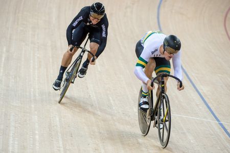 Matthew Glaetzer of Australia (R) competes with New Zealand's Ethan Mitchell in the men's sprint quarter-finals at the 2017 Track Cycling World Championships