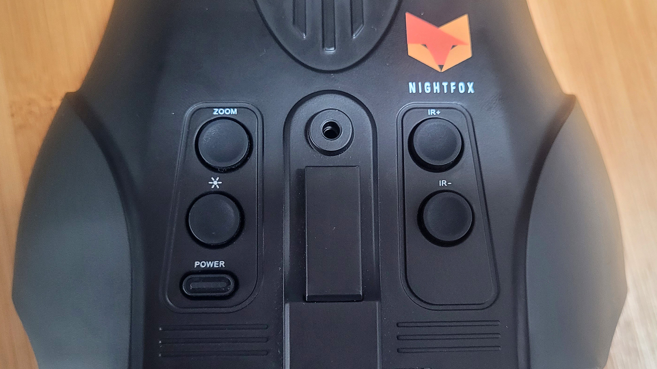 A close up of the Nightfox Swift's five buttons