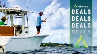 Man fishing on boat wearing Garmin Quatix 7 Sapphire watch