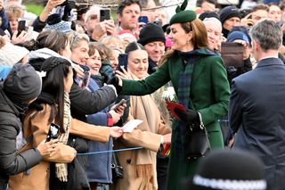 Kate Middleton wears a green coat and hat to meet royal fans outside St Mary Magdalene church in Sandringham on Christmas Day