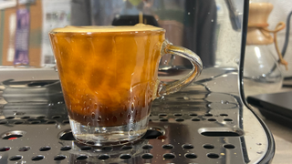 a picture of an espresso shot extracted by the smeg EGF03 machine