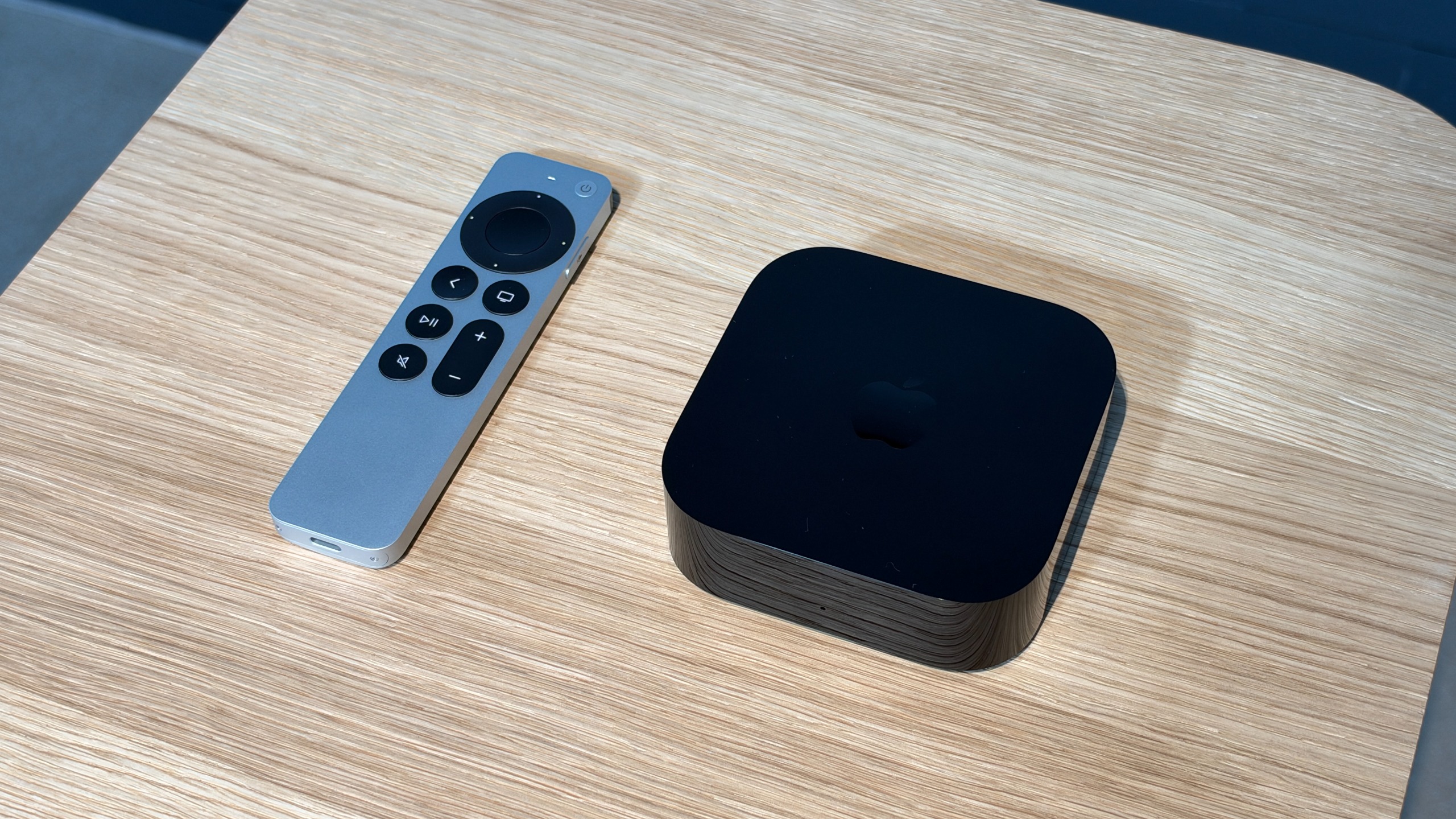 The new Siri Remote with Precision Finding support and the new Apple TV 4K (4th Generation).