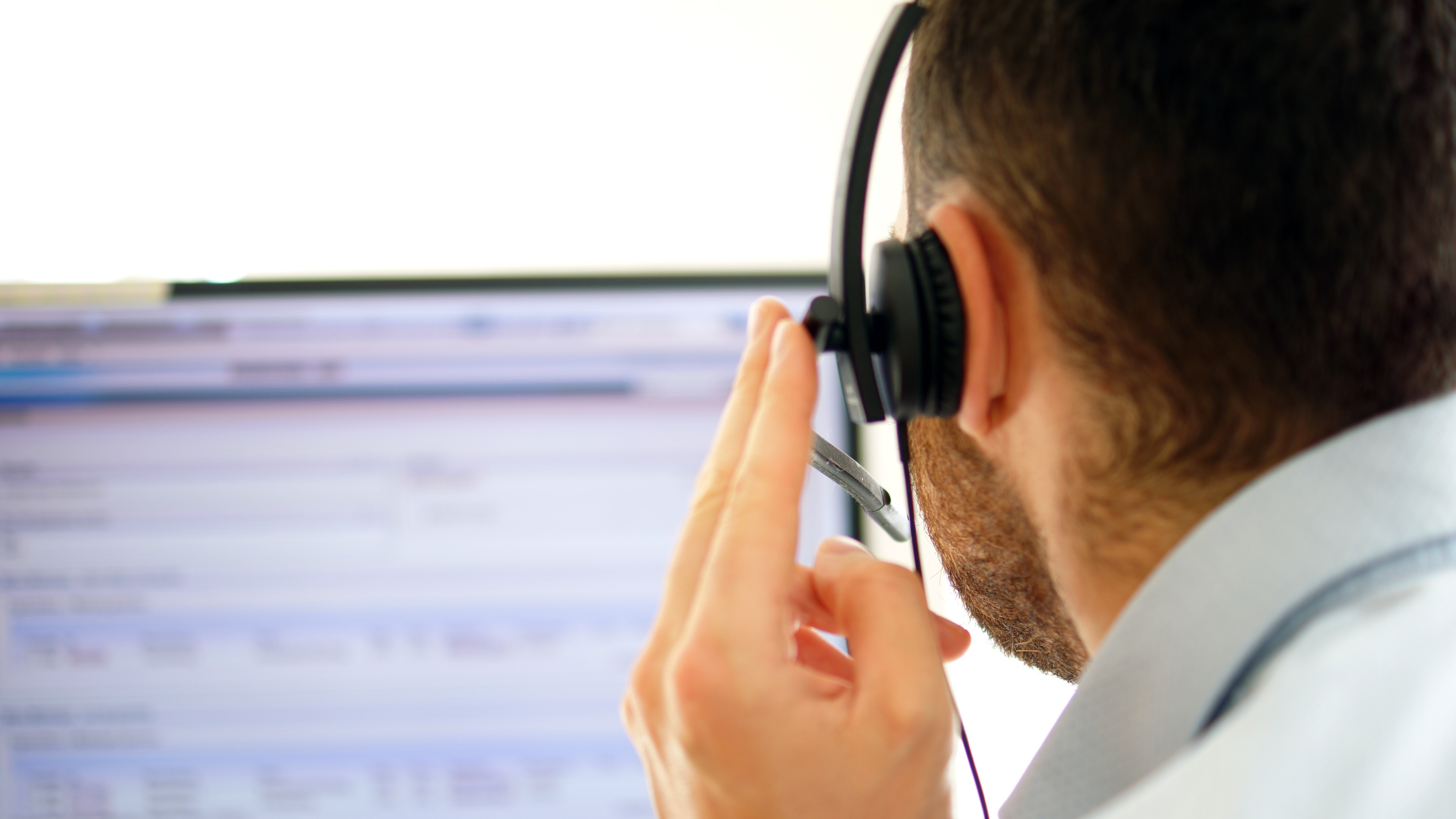 Account manager makes phone calls in a call center