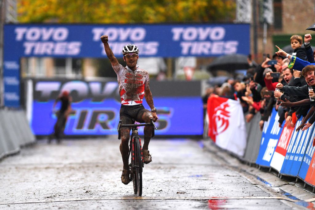 OVERIJSE BELGIUM OCTOBER 31 Eli Iserbyt of Belgium and Team Pauwels Sauzen Bingoal celebrates at finish line as race winner during the 62nd Druivencross Overijse UCI CycloCross Worldcup 2021 Mens Elite DruivencrossOverijse CXWorldCup UCIcyclocrossWC on October 31 2021 in Overijse Belgium Photo by Luc ClaessenGetty Images