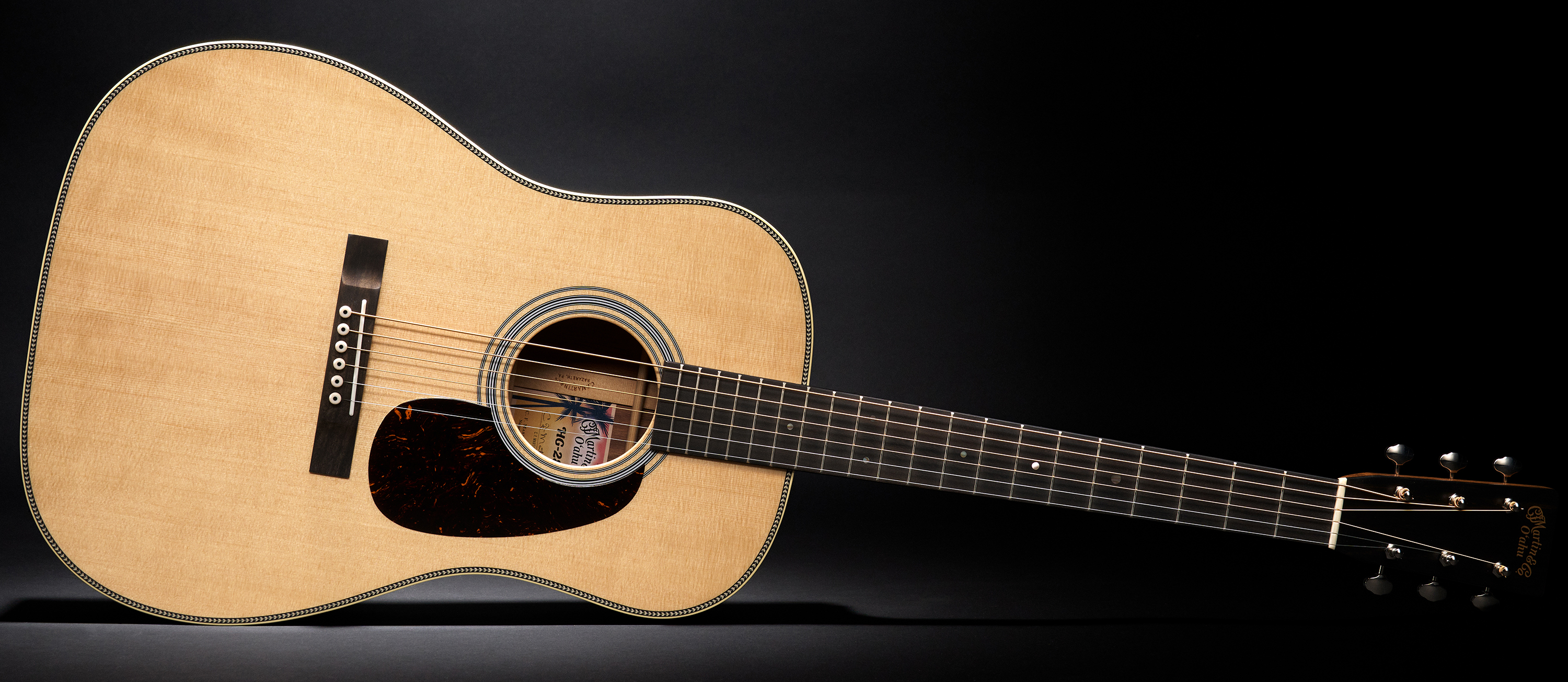 A photo of the Martin O’ahu HG-28 acoustic guitar