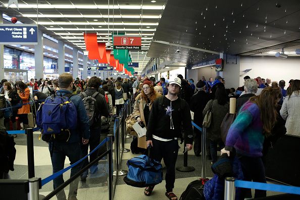 Travelers at O&amp;#039;Hare International Airport on December 23, 2016.