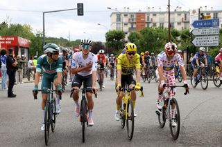 Tadej Pogacar, Jasper Philipsen, Jullio Ciccone, Jonas Vingegaard riding togehter stage 21 of the tour de france