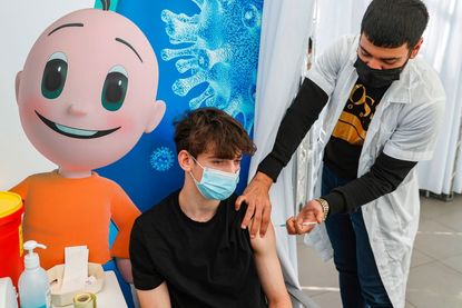 16-year-old gets vaccinated in Israel