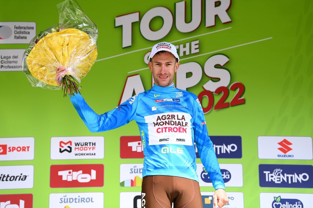 LIENZ AUSTRIA APRIL 21 Geoffrey Bouchard of France and AG2R Citroen Team celebrates winning the blue mountain jersey on the podium ceremony after the 45th Tour of the Alps 2022 Stage 4 a 1424km stage from Villabassa to Kals am Grossglockner 1336m TouroftheAlps on April 21 2022 in Lienz Austria Photo by Tim de WaeleGetty Images
