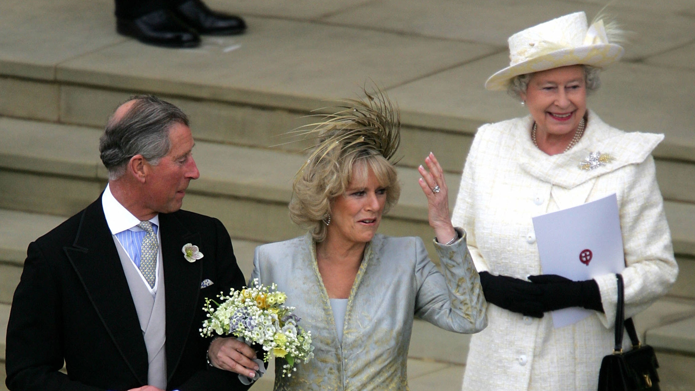King Charles, Camilla and Queen Elizabeth II leave the Service of Prayer and Dedication following their marriage at The Guildhall, at Windsor Castle on April 9, 2005
