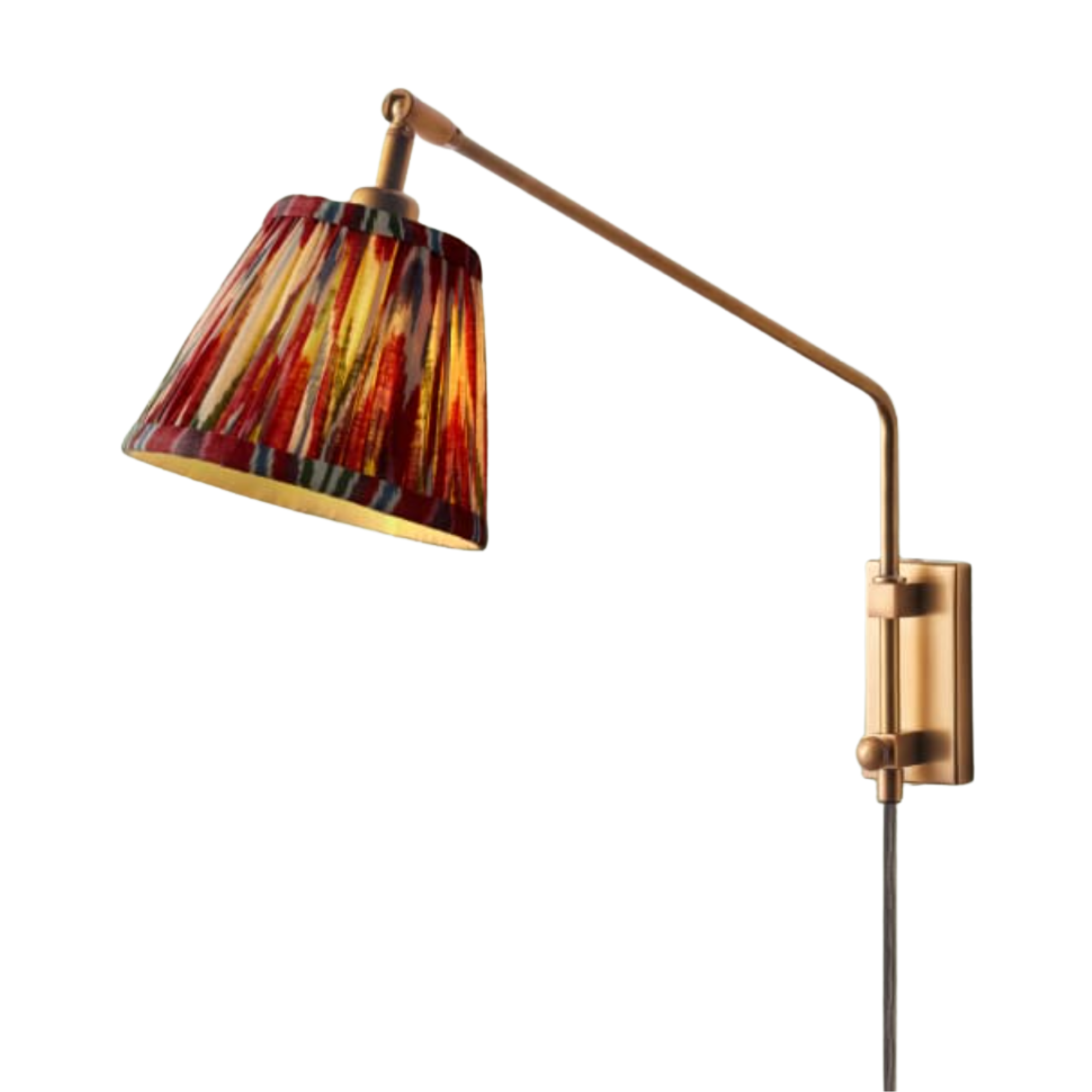 a brass plug in sconce with a fabric shade