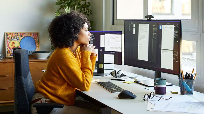 Woman staring at a computer screen