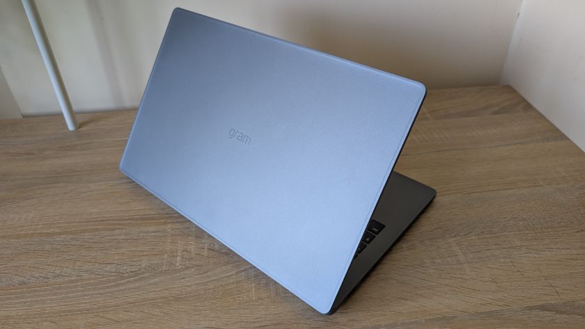 The LG Gram Book laptop pictured on a wooden desk.