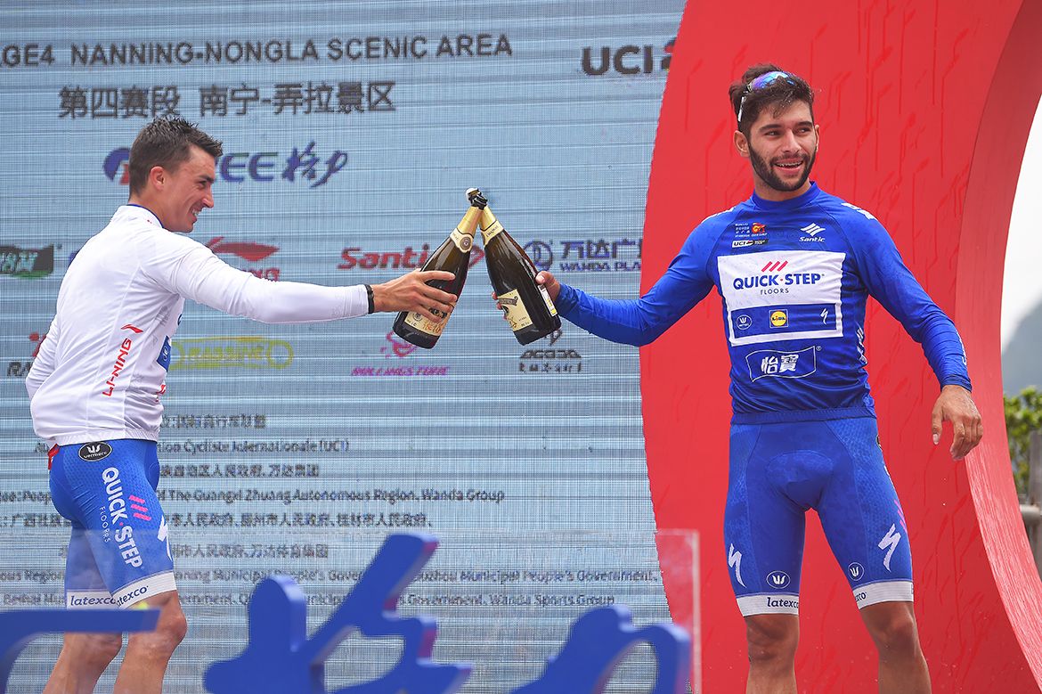 Quick-Step Floors' Alaphilippe and Gaviria on the podium in their respective jerseys