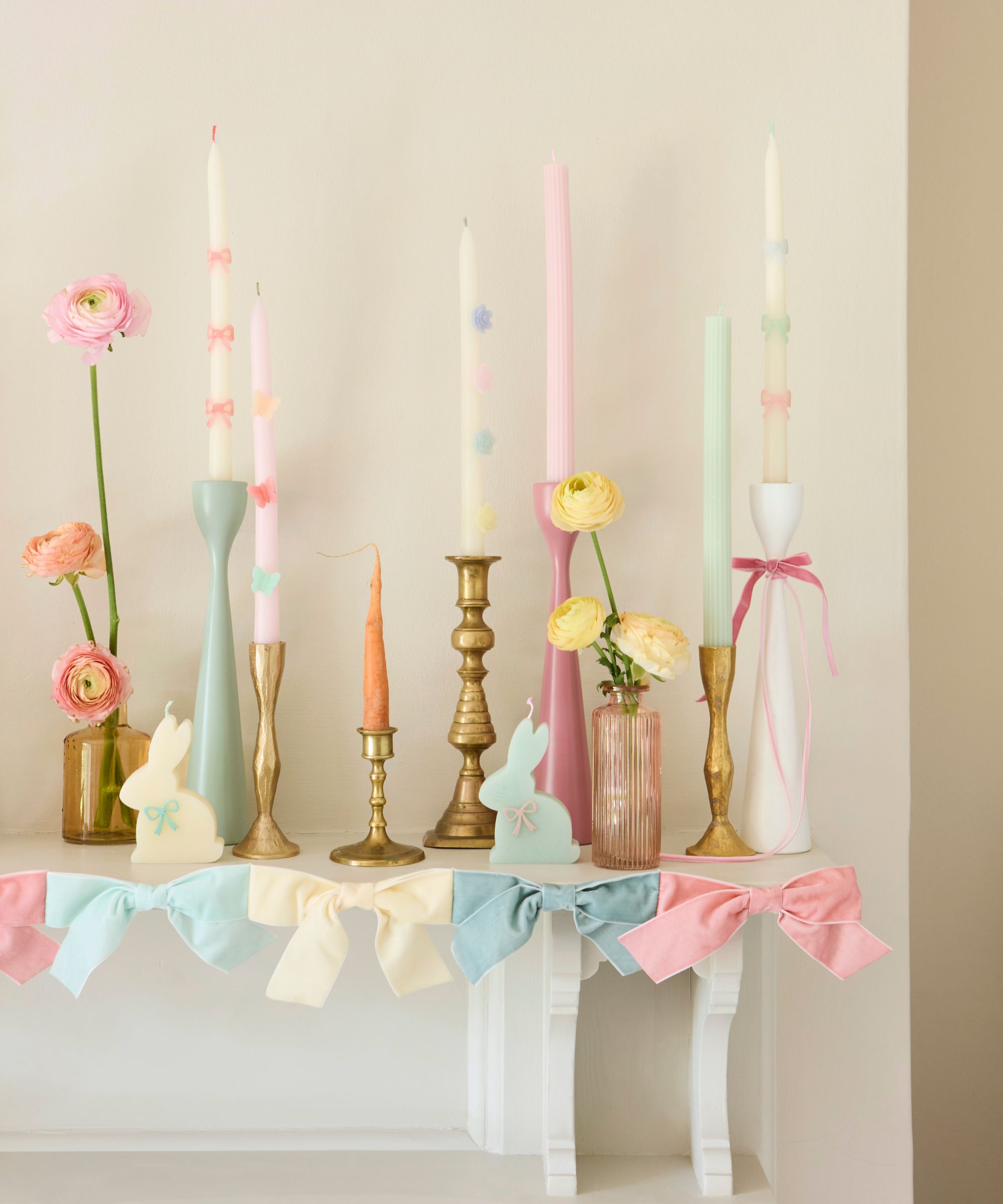 Easter mantelpiece styling with pastel candles and ribbons