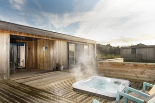 hot tub placement rules: Luxury Coastal decking