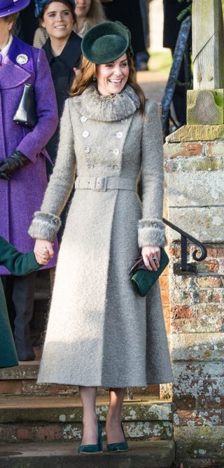 Kate Middleton in a gray Catherine Walker coat on Christmas Day 2019.