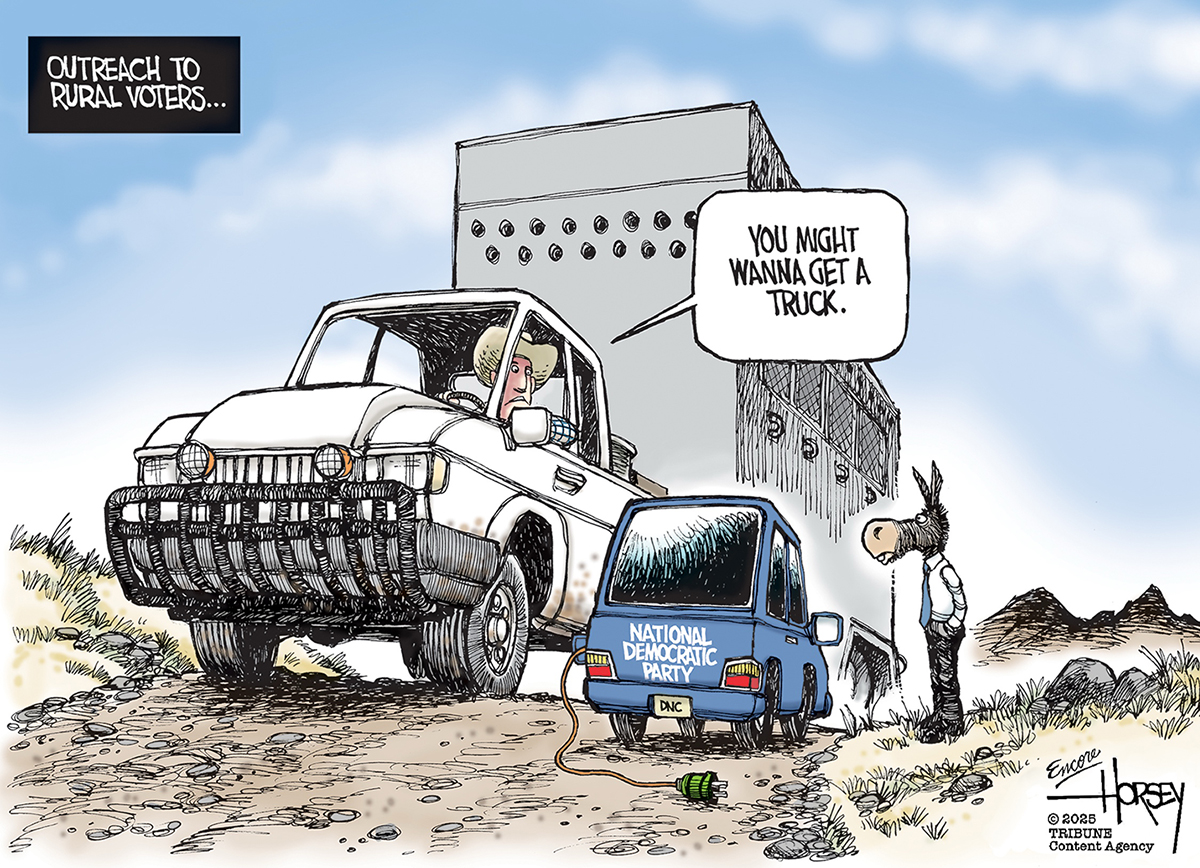 This cartoon is titled "OUTREACH TO RURAL VOTERS..." It takes place on a dirt road with an abandoned building in the background. A donkey stands next to blue car labeled "NATIONAL DEMOCRATIC PARTY DNC." Another driver in a pickup truck says "YOU MIGHT WANNA GET A TRUCK."
