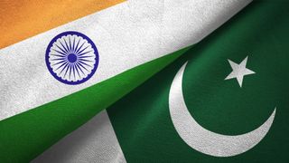 Pakistan and India two flags together textile cloth fabric texture - stock photo